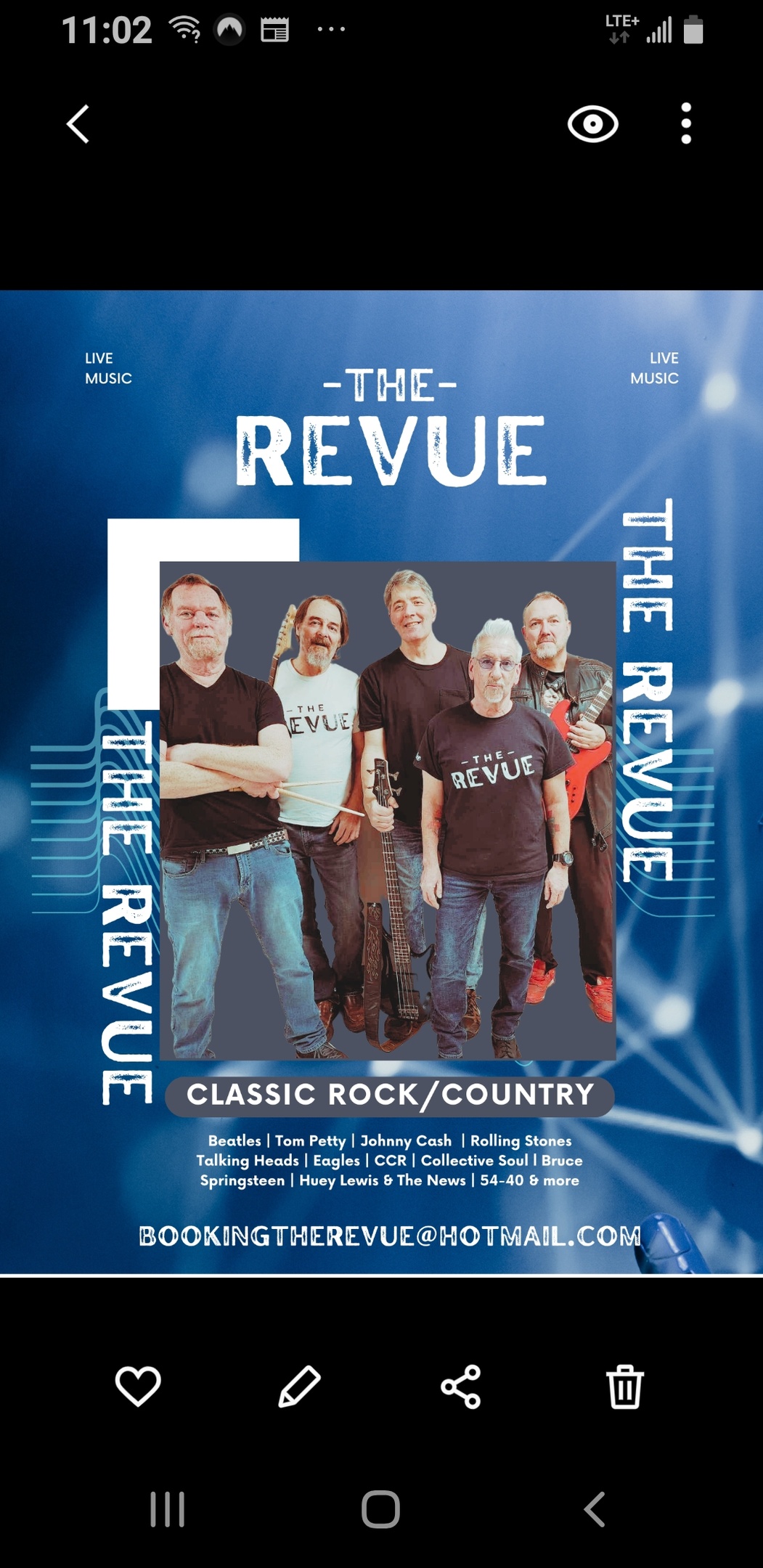 The Revue band 5 men standing wearing The Revue T shirts.